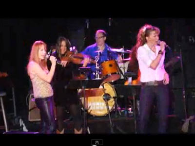 Lucy Lawless and Renee O'Connor sing